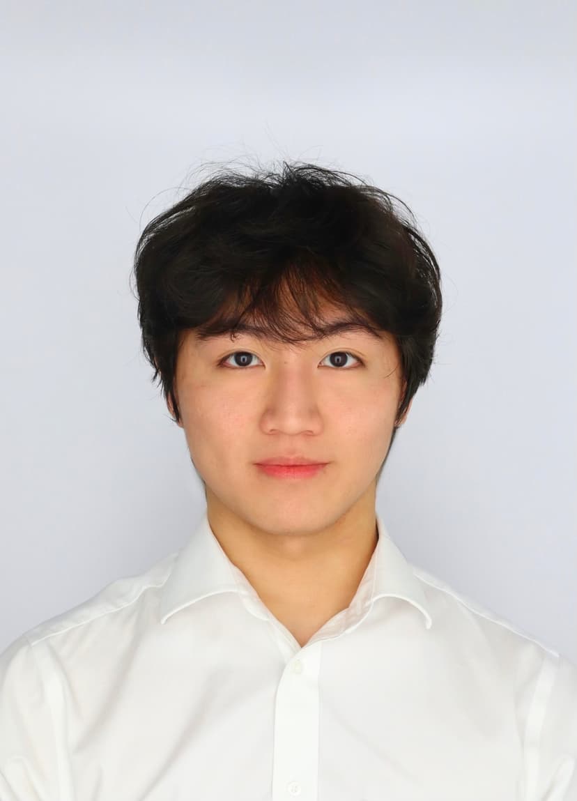 Charlie Lin smiling outdoors